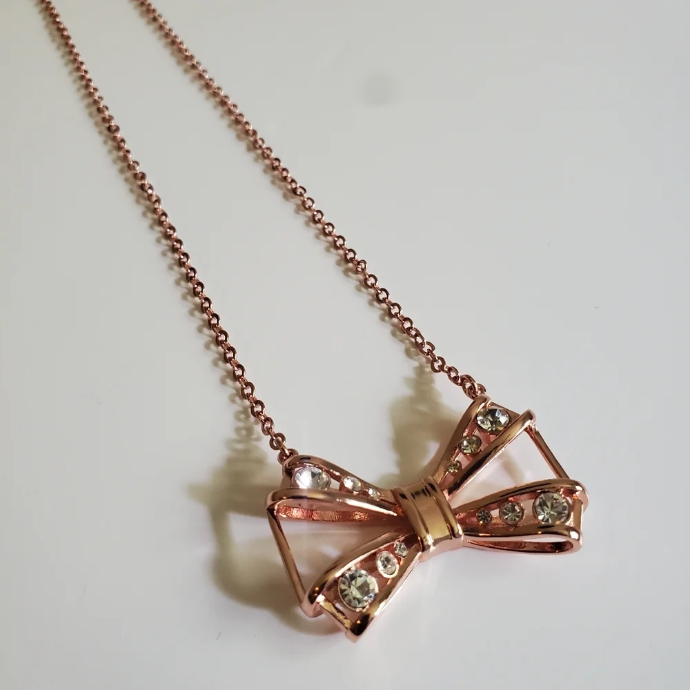 Ted Baker Gianni ROSE GOLD Joia Geometric Bow Pendant Necklace